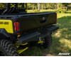 Close rear view of the SuperATV sheet metal rear bumper with D-rings under the tailgate of a Can-Am Defender
