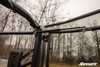 Inside view of the SuperATV Honda Pioneer 1000 cab door tube frame and clear panel seen from the seat
