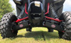 Low rear view of a Honda Talon 1000 X with Trail Armor guards bolted under the red trailing arms, on grass