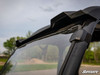 Close-up of the SuperATV full windshield upper clamp and rubber edge on the John Deere Gator 835 cage