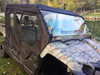Side X Side full cab enclosure on a camouflage Yamaha Viking VI, black doors and hard windshield, front view