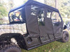 Rear three-quarter view of a camouflage Yamaha Viking VI with black Side X Side full cab enclosure doors