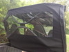 Close-up of the Side X Side rear window panel with clear vinyl above the Kawasaki Teryx 4 cargo bed