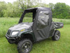 3 Star soft doors with zippered windows on a green Arctic Cat Prowler 550, front three-quarter view