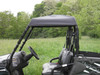 3 Star black soft top mounted on the roll cage of an Arctic Cat Prowler, close view from the driver side