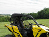 Side view of the 3 Star soft top mounted on the roll cage of a yellow Can-Am Maverick