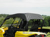 3 Star black soft top on a yellow Can-Am Maverick, rear three-quarter view over the cargo area