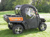 Rear three-quarter view of an orange CF Moto UForce with 3 Star soft doors and rear window installed