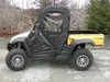 3 Star soft full doors kit on a yellow Cub Cadet Challenger with soft top, side view on pavement