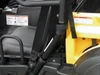 Close-up of the 3 Star soft top strap attachment on the cage pillar next to the seat of a Cub Cadet Challenger