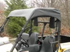 3 Star black soft top installed on a yellow Cub Cadet Challenger 500, close front three-quarter view of the cab
