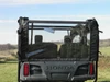 Close-up of the 3 Star clear vinyl rear window panel above the tailgate of a Honda Pioneer 700-4