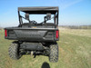Rear view of the 3 Star soft top over the cab of a Honda Pioneer 1000, seen from the tailgate