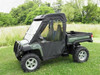 3 Star soft doors and rear window combo on a green John Deere Gator XUV, driver side front three-quarter view in a field