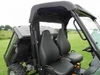 Driver side view of the 3 Star soft back panel window behind the seats of the John Deere Gator under a hard roof