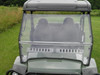 Straight-on front view of the 3 Star two-piece windshield on the John Deere Gator XUV showing the split line and vent slots