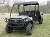 Camo John Deere Gator XUV-4 with the 3 Star black soft top installed, front three-quarter view in a field