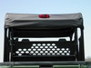 Rear close-up of a 3 Star black soft top edge over the John Deere Gator cab, brake light and mesh rear screen below