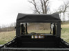 Close rear view of the 3 Star rear window panel over the bed of the camo John Deere Gator