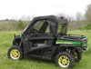 Front three-quarter view of the 3 Star soft doors with clear windows on a green John Deere Gator 850i