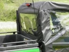 Close-up of the clear rear window and side panel of the 3 Star John Deere Gator RSX 850i/860i cab enclosure
