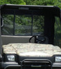 View through the Kawasaki Mule cab showing the 3 Star soft back panel window behind the camo bench seat