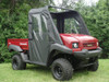 3 Star black soft doors with clear windows on a red Kawasaki Mule 4000/4010, front three-quarter view on grass