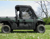 3 Star soft doors and rear window combo on a green Kawasaki Mule Pro-FX, side view with doors closed in a field