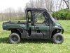 Driver side profile of a green Kawasaki Mule ProFX with the 3 Star cab enclosure doors and rear window closed