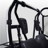 Kolpin clear rear window clamped to the Honda Pioneer 500 roll cage behind the seats, close-up from the side