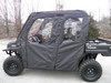 3 Star soft doors on a Kawasaki Mule Pro FXT, black doors with clear windows, side view in a lot
