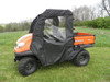 Orange Kubota RTV 400/500 with the 3 Star soft door kit, passenger side view parked in a field