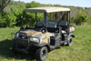 3 Star tan soft top on a camo Kubota RTV1140 four-seat crew, front three-quarter view in a field