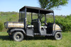 Black color option of the 3 Star soft top on the camo Kubota RTV1140, side view under a tree