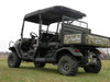 Rear three-quarter view of the camo Kubota RTV X1140 with the 3 Star soft top covering both rows of seats