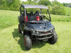 3 Star gray soft top on a black Intimidator Classic with red seats, front three-quarter view in a field