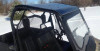 Extreme Metal Products black aluminum top installed on a Honda Pioneer 700 in snow, rear three-quarter view of the roof