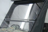 Close-up of the 3 Star two-piece windshield split line and side edge inside the soft enclosure on the Yamaha Rhino