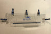 Extreme Metal Products Maverick X3 clear cab back panel with three top tube clamps and side clamps, laid on white