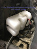 Extreme Metal Products two-liter washer bottle mounted under the X3 hood with bracket and pump hose