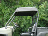 3 Star black soft top installed on the cage of a green Polaris Ranger 500/700, close-up from the driver side