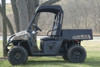 Black 3 Star soft top on a camouflage Polaris Ranger 570, driver side profile under a tree