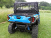 Rear three-quarter view of a blue Polaris General with the 3 Star soft rear window installed