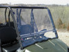 3 Star clear two-piece windshield with black clamps on a green Polaris Ranger 700 Crew, front three-quarter view