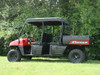 Red Polaris Ranger 700 Crew with 3 Star soft top, full side view showing the black canopy