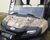 Extreme Metal Products clear Lexan half windshield installed on a camo Honda Pioneer 700, front view with winch