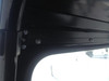 Close-up of the Extreme Metal Products windshield frame bolted to the Honda Pioneer 700 roll cage post