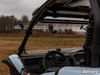 View from inside the Kawasaki Teryx KRX 1000 cab with the SuperATV windshield flipped up above the dash