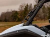 Close-up of the SuperATV flip windshield side pivot on the Kawasaki Teryx KRX 1000 cage tube