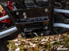 Close-up of the SuperATV hitch mounting plate and bolts installed under the KRX rear frame